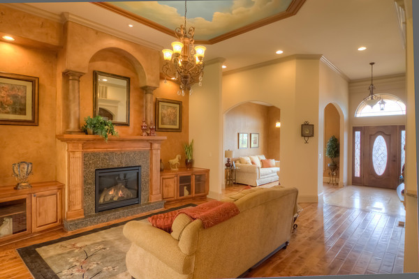 Example of a tuscan family room design in Portland