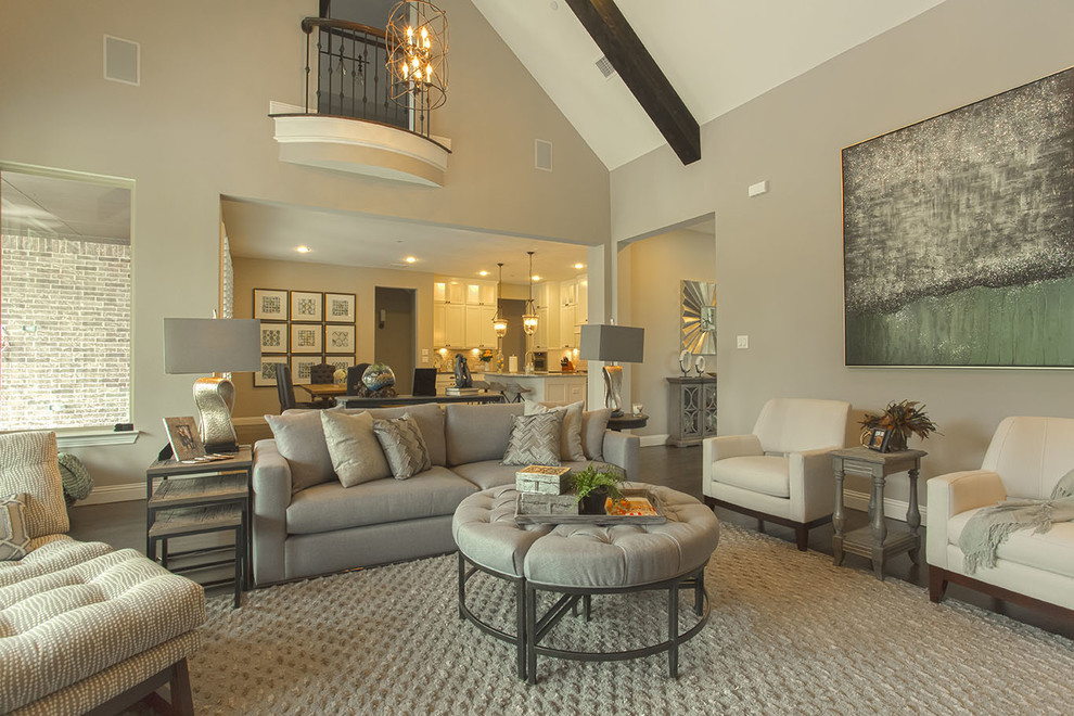 Medium sized traditional open plan games room in Dallas with grey walls, dark hardwood flooring, a wall mounted tv, a standard fireplace, a tiled fireplace surround and brown floors.
