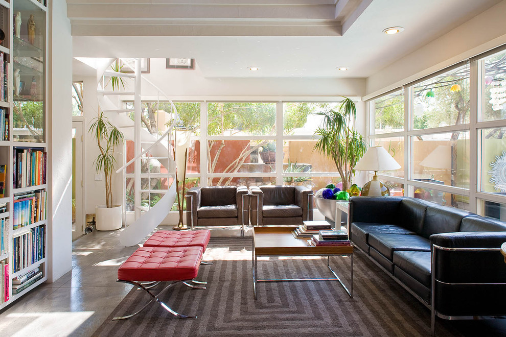 Example of a minimalist family room design in Portland