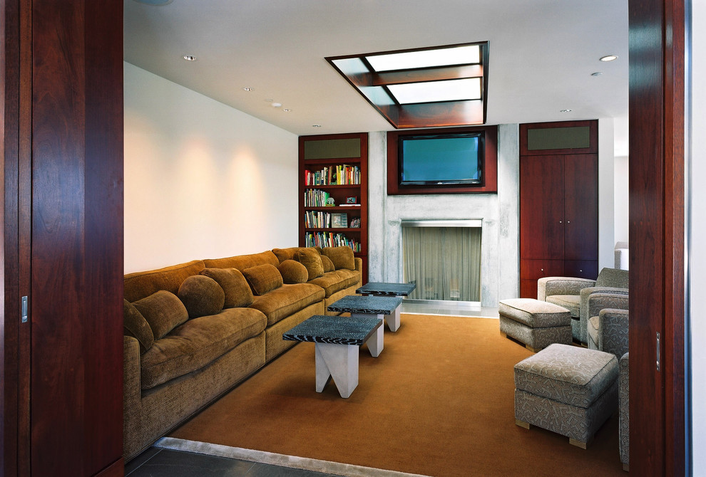 Inspiration pour une salle de séjour design avec un manteau de cheminée en béton.