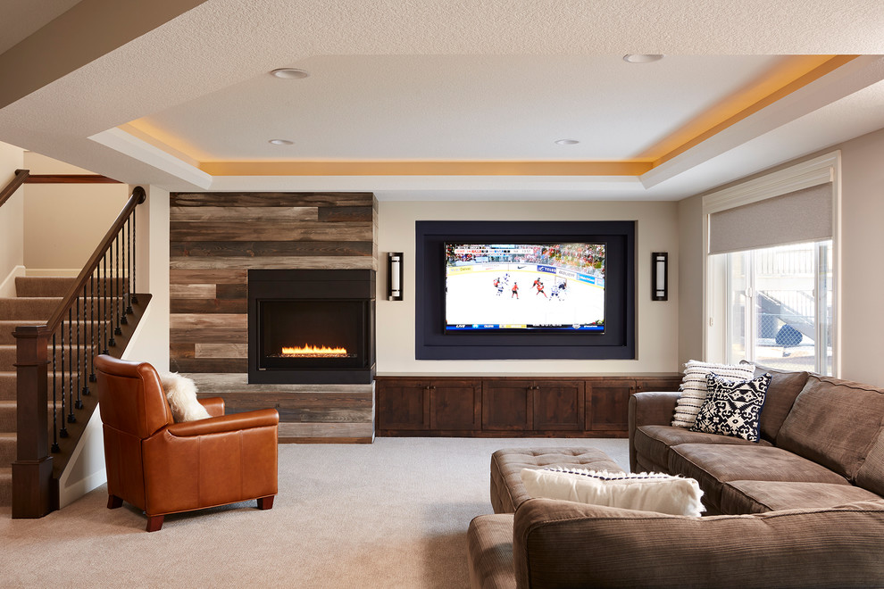 Mid-sized elegant open concept carpeted and beige floor family room photo in Minneapolis with beige walls, a corner fireplace, a wood fireplace surround and a wall-mounted tv