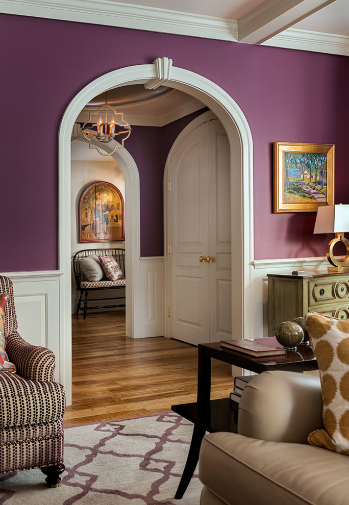 Inspiration for a transitional family room remodel in Boston with purple walls