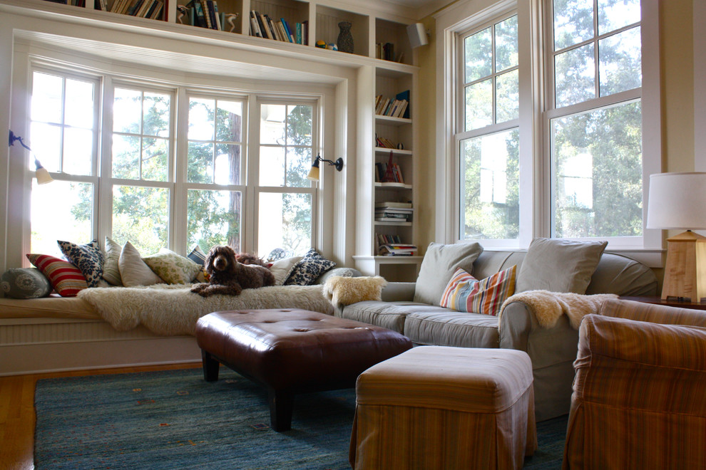 Family room library - traditional family room library idea in San Francisco with beige walls