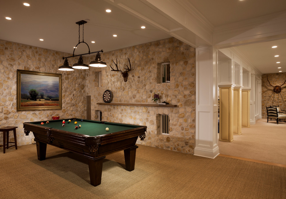 This is an example of a classic open plan games room in Salt Lake City with beige walls and carpet.