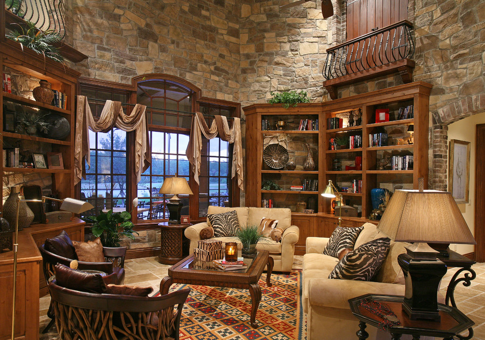 Пример оригинального дизайна: гостиная комната в средиземноморском стиле с с книжными шкафами и полками