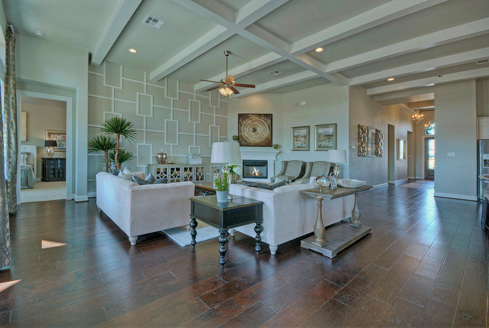 Huge transitional open concept dark wood floor family room photo in Austin with white walls, a corner fireplace and no tv