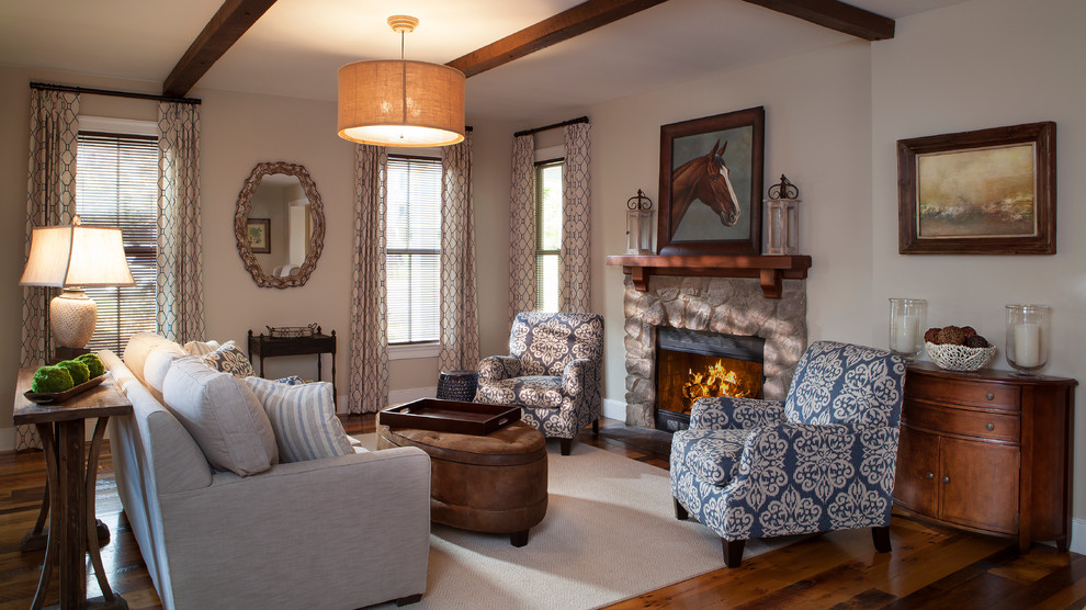 Inspiration for a mid-sized open concept medium tone wood floor family room remodel in Charlotte with beige walls, a standard fireplace and a stone fireplace
