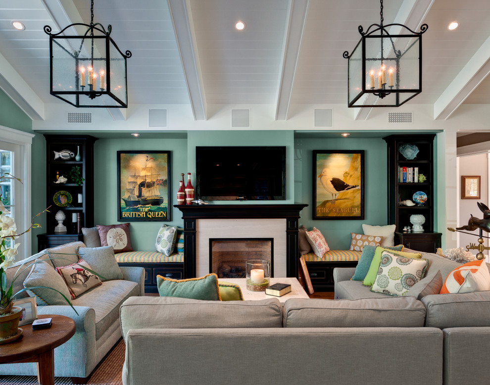 Inspiration for a mid-sized timeless open concept family room remodel in San Francisco with a standard fireplace, a wall-mounted tv, green walls and a stone fireplace