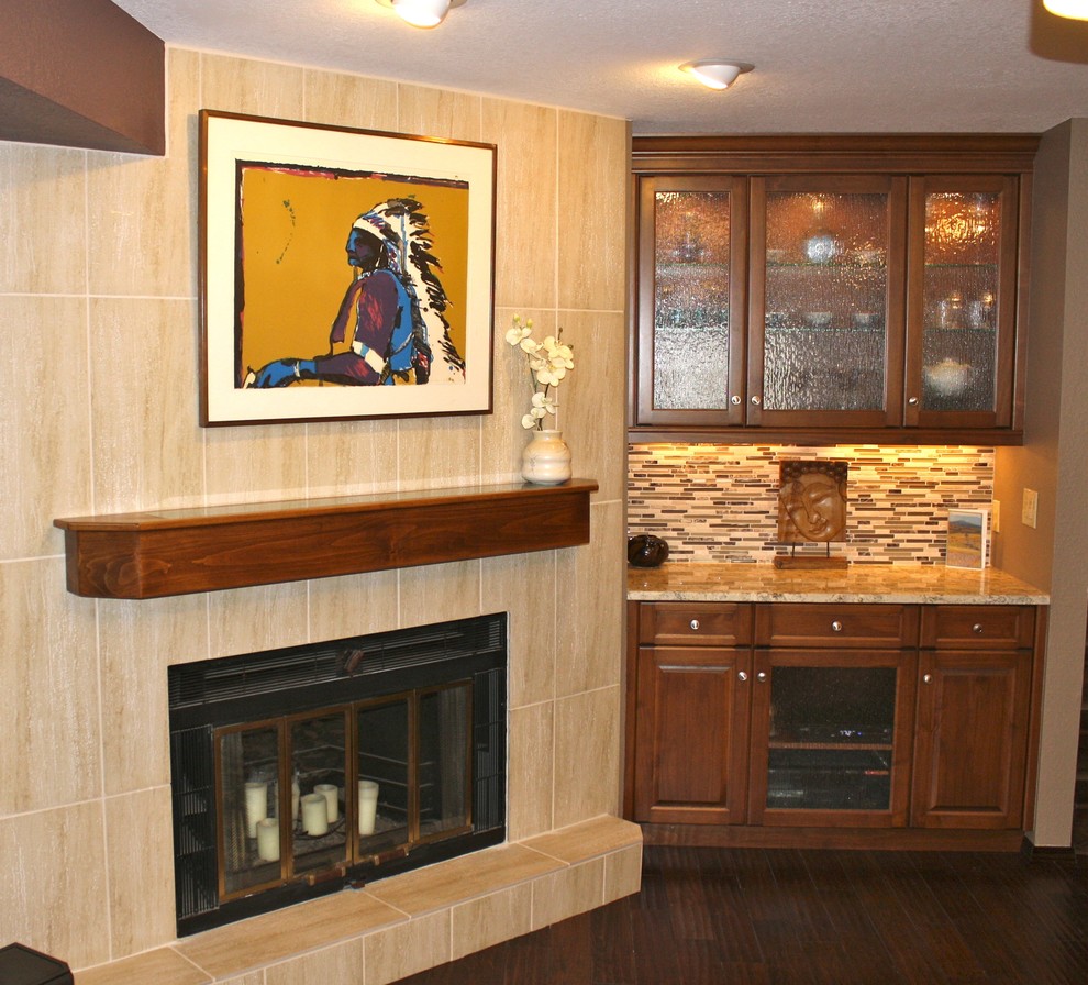 Mid-sized elegant open concept dark wood floor family room photo in Denver with a bar, beige walls, a standard fireplace, a tile fireplace and no tv