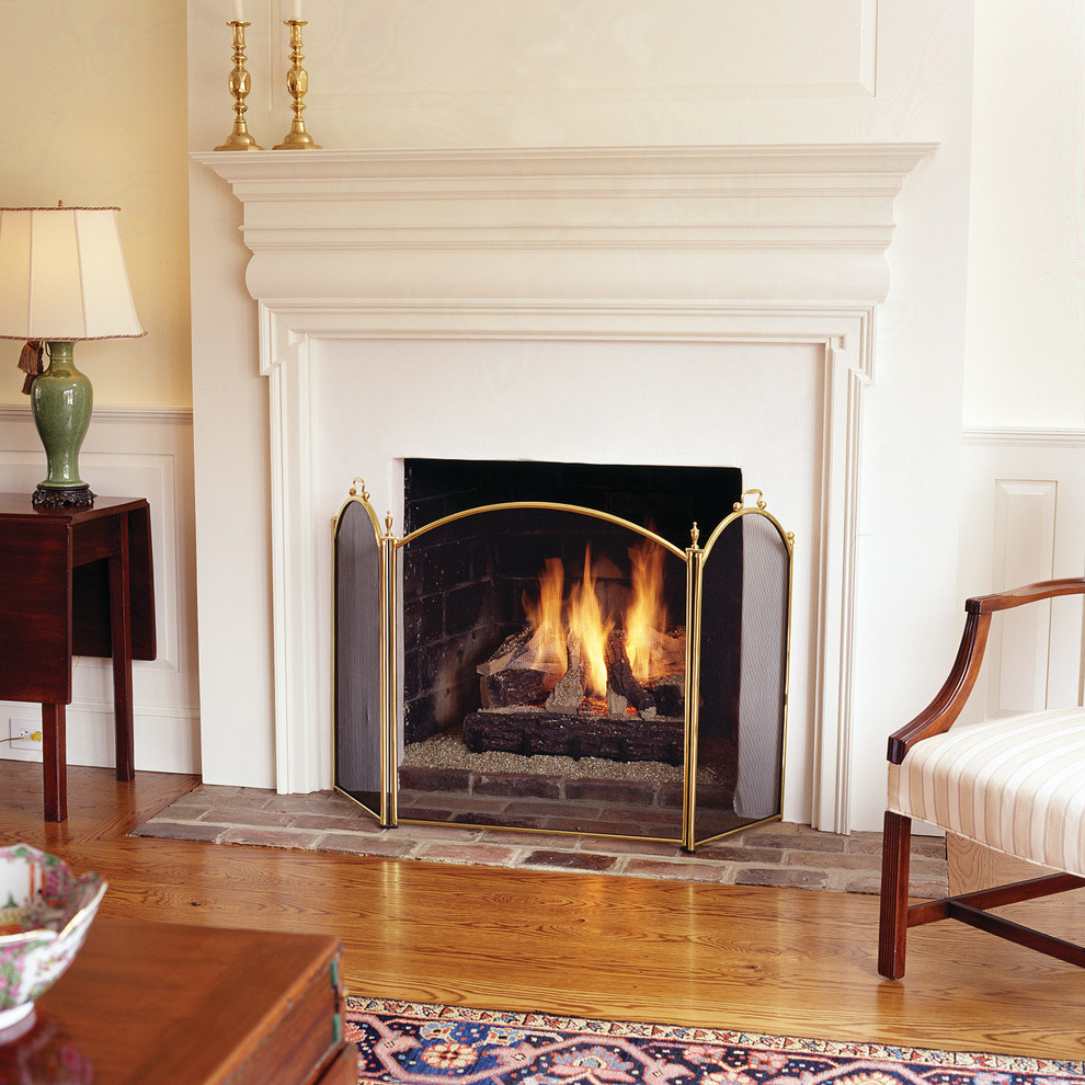 Inspiration for a classic games room in Philadelphia with a standard fireplace and a wooden fireplace surround.