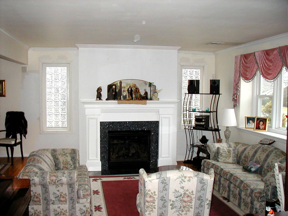 Example of a classic family room design in Newark