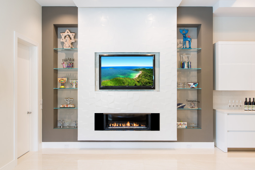 Expansive contemporary open plan games room in Miami with white walls, porcelain flooring, a ribbon fireplace, a tiled fireplace surround and a wall mounted tv.