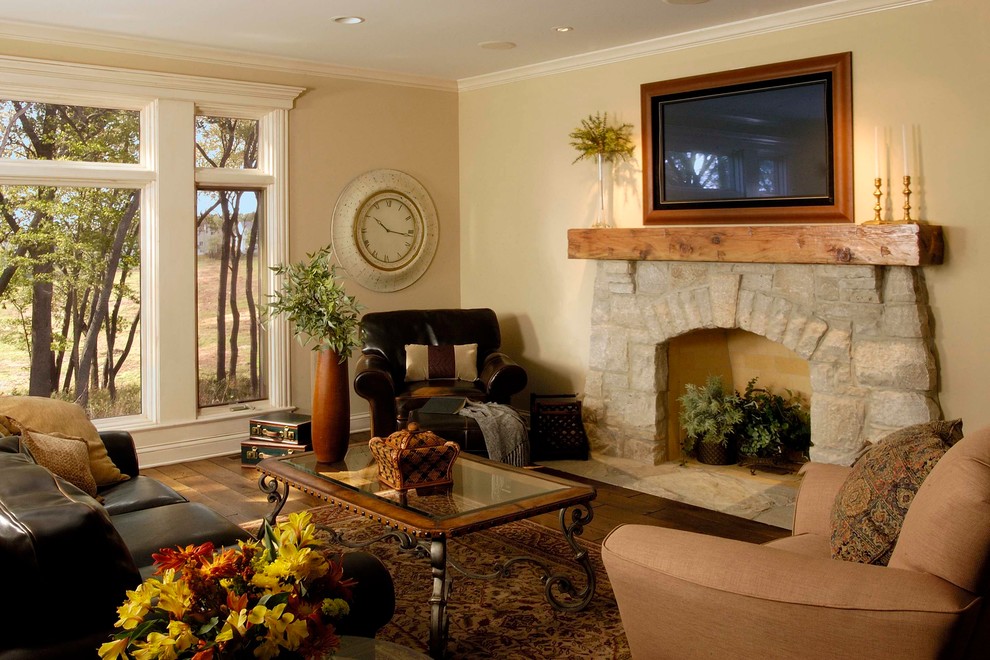 Photo of a medium sized classic open plan games room in Chicago with a stone fireplace surround, beige walls, medium hardwood flooring, a standard fireplace and a wall mounted tv.