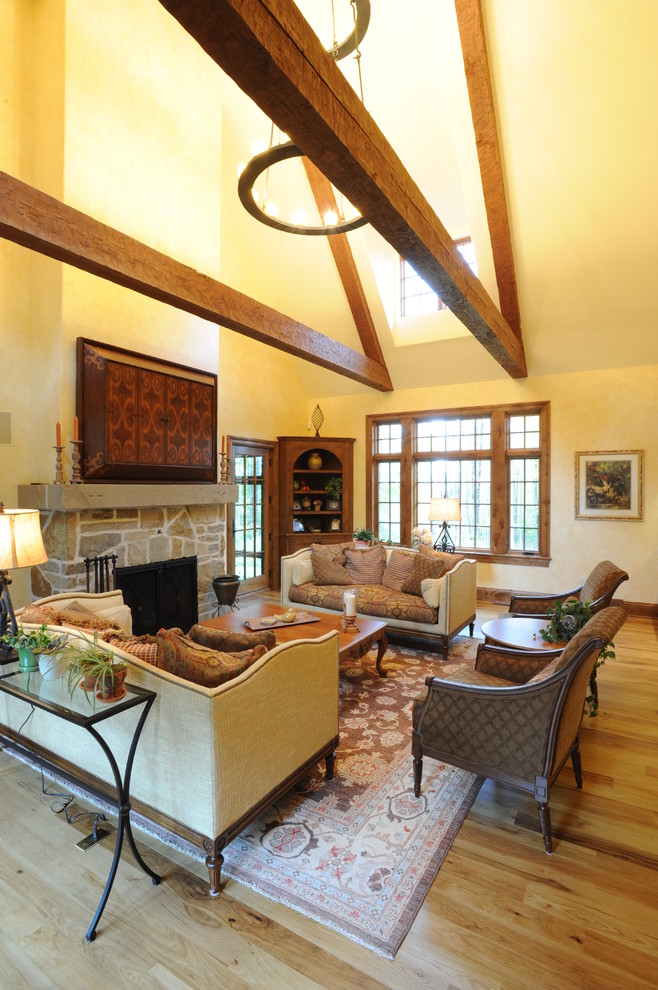 Example of a french country family room design in Cleveland