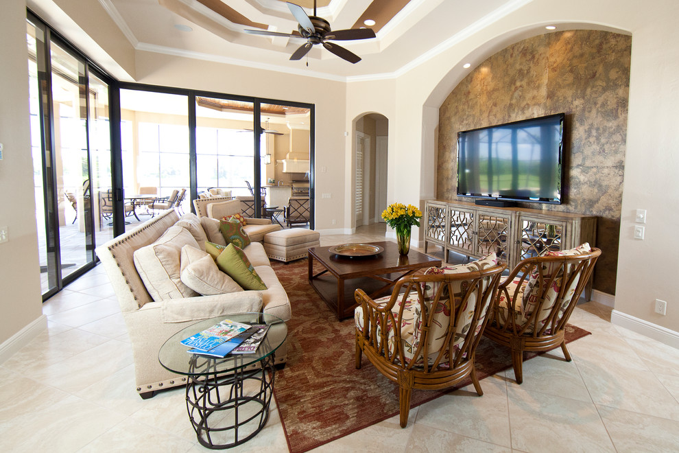 Tuscan family room photo in Miami