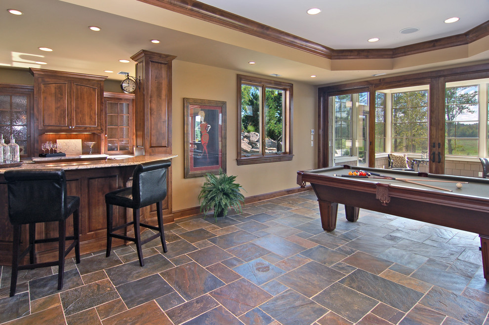 Family room - traditional multicolored floor and slate floor family room idea in Minneapolis