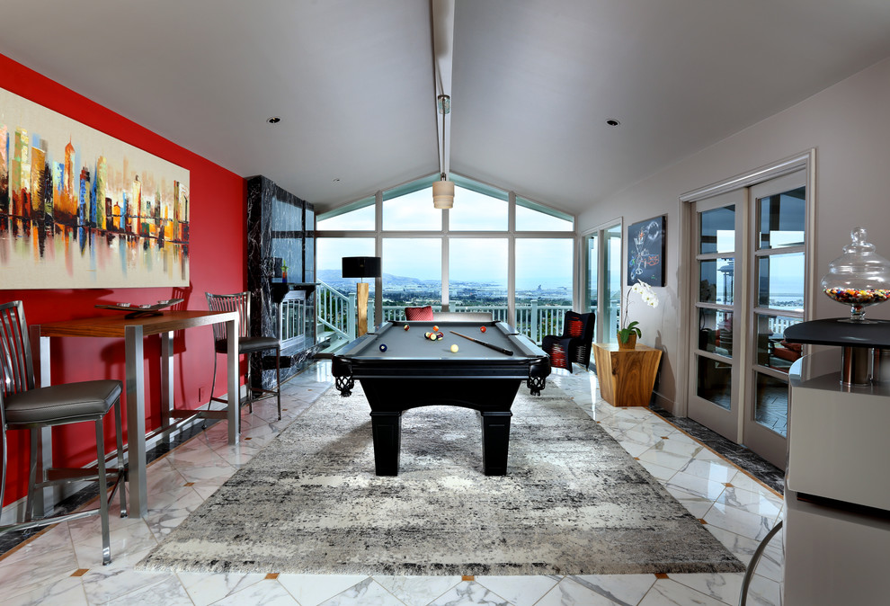 Design ideas for a large contemporary enclosed games room in San Francisco with red walls, marble flooring, a standard fireplace, a stone fireplace surround and no tv.