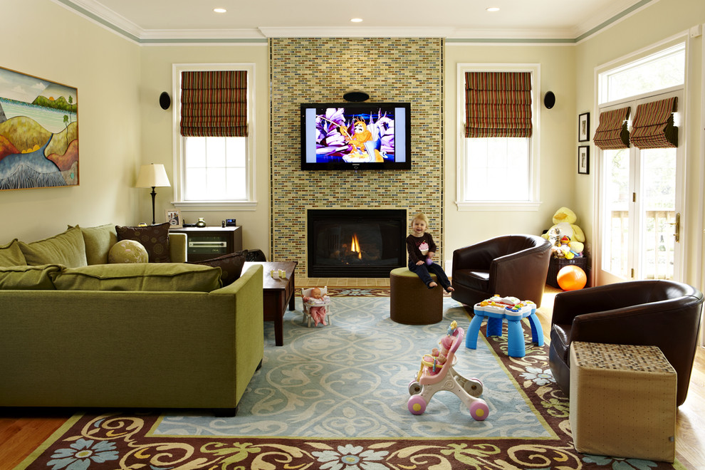 Traditional games room in DC Metro with a tiled fireplace surround.