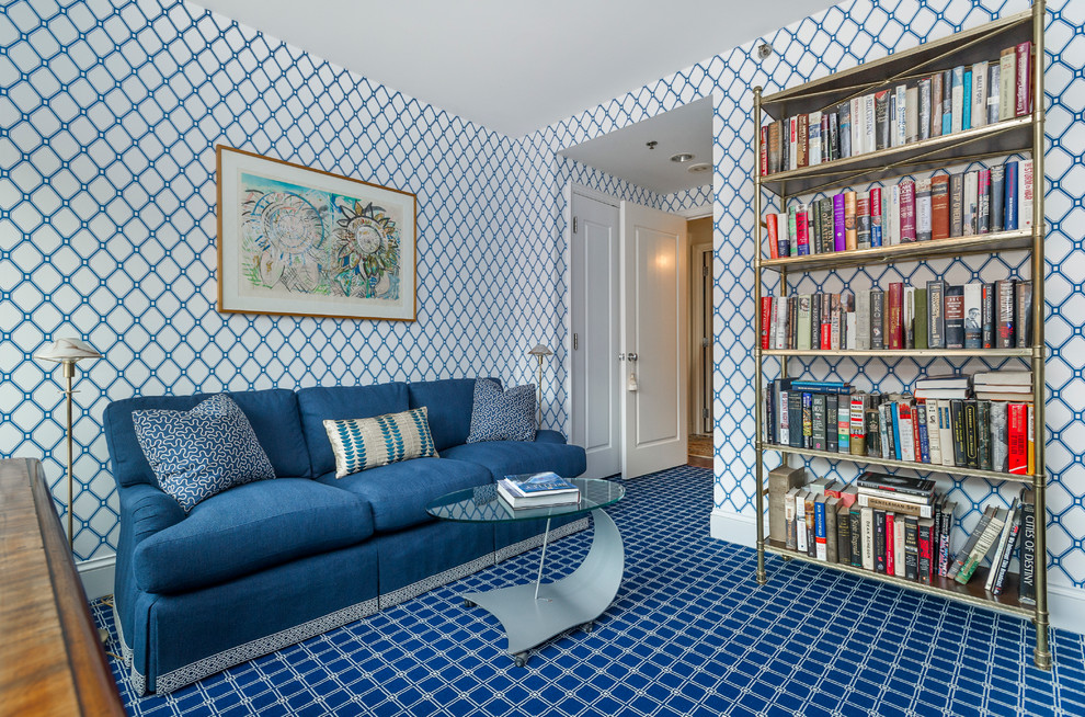 This is an example of a traditional games room in Boston with a reading nook, blue walls and carpet.