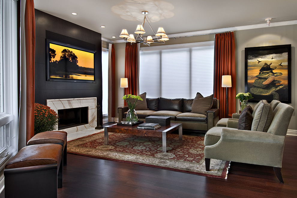 Design ideas for a medium sized contemporary games room in Detroit with beige walls, dark hardwood flooring, a standard fireplace, a wall mounted tv, a stone fireplace surround and brown floors.