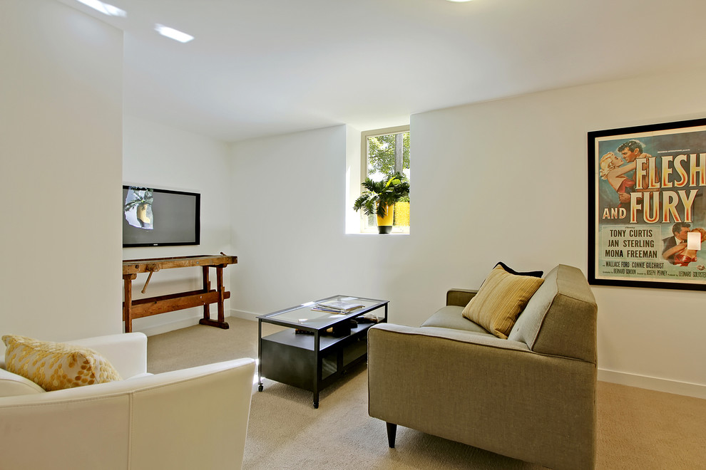 Example of a trendy family room design in Seattle with white walls