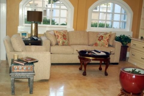Elegant family room photo in Tampa