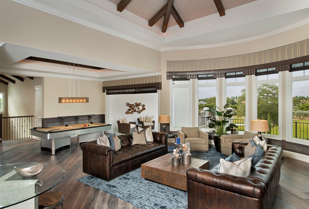 Design ideas for an expansive classic open plan games room in Miami with a game room, beige walls, medium hardwood flooring, a wall mounted tv and brown floors.