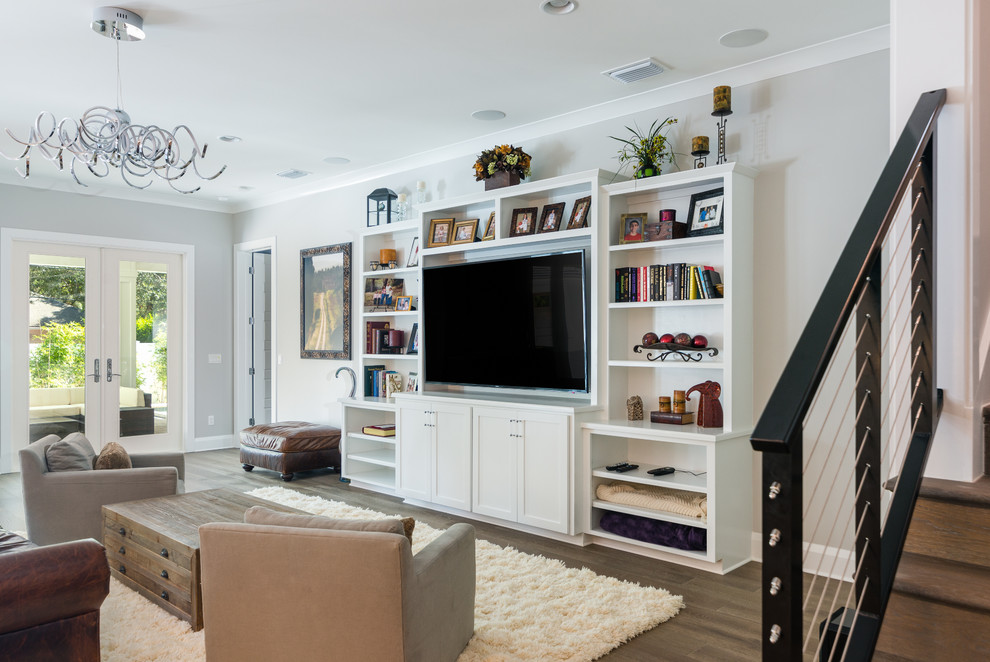 Example of a trendy family room design in Tampa