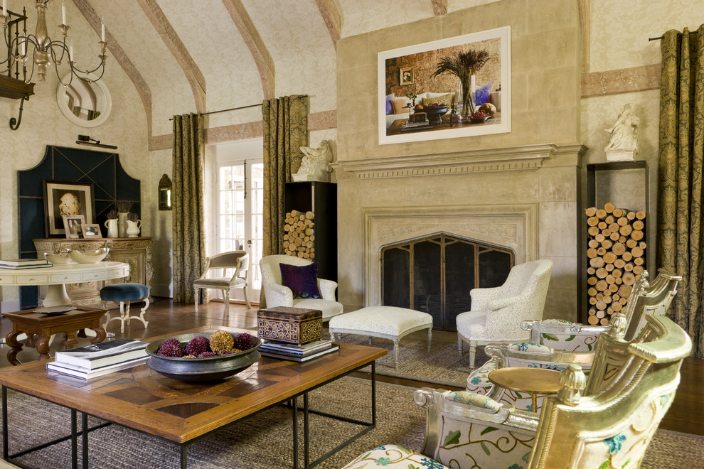 Foto de sala de estar clásica con paredes beige, suelo de madera oscura y todas las chimeneas