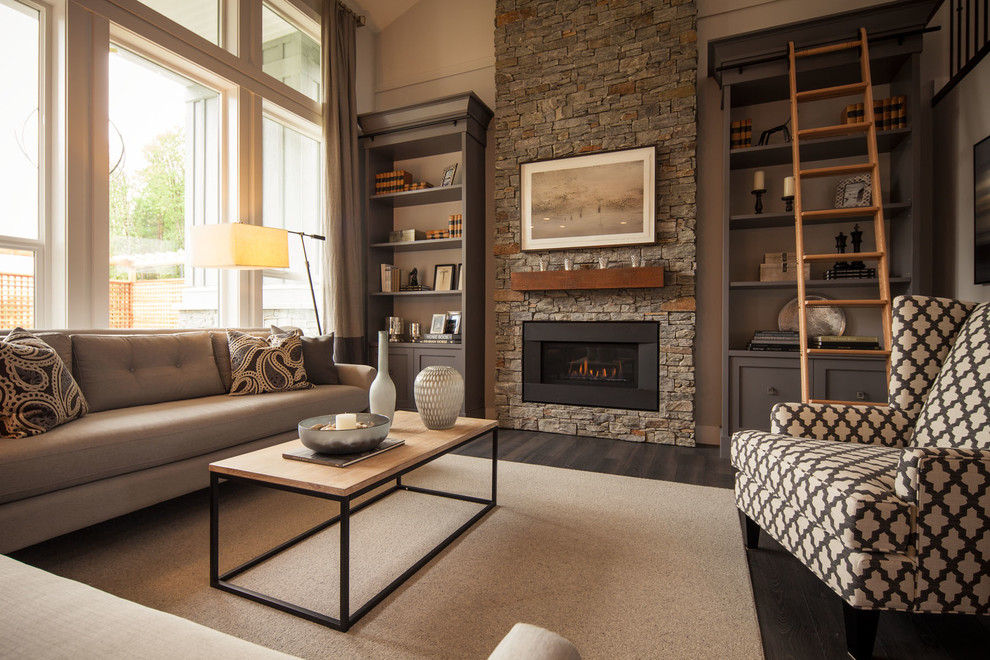 Inspiration for a classic games room in Vancouver with a standard fireplace, a tiled fireplace surround and no tv.