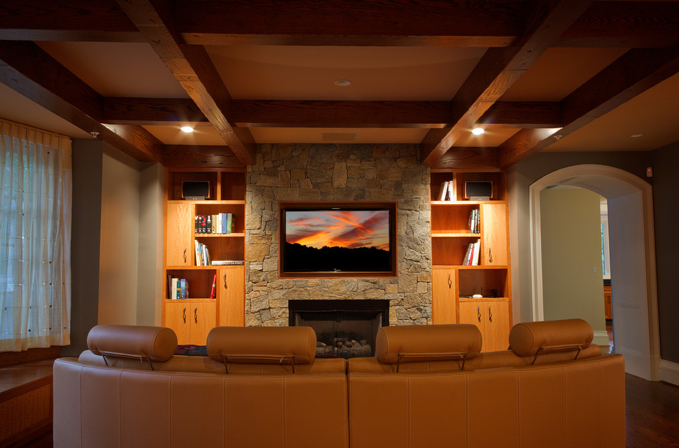 Large contemporary open plan games room in DC Metro with grey walls, dark hardwood flooring, a standard fireplace, a stone fireplace surround and a built-in media unit.