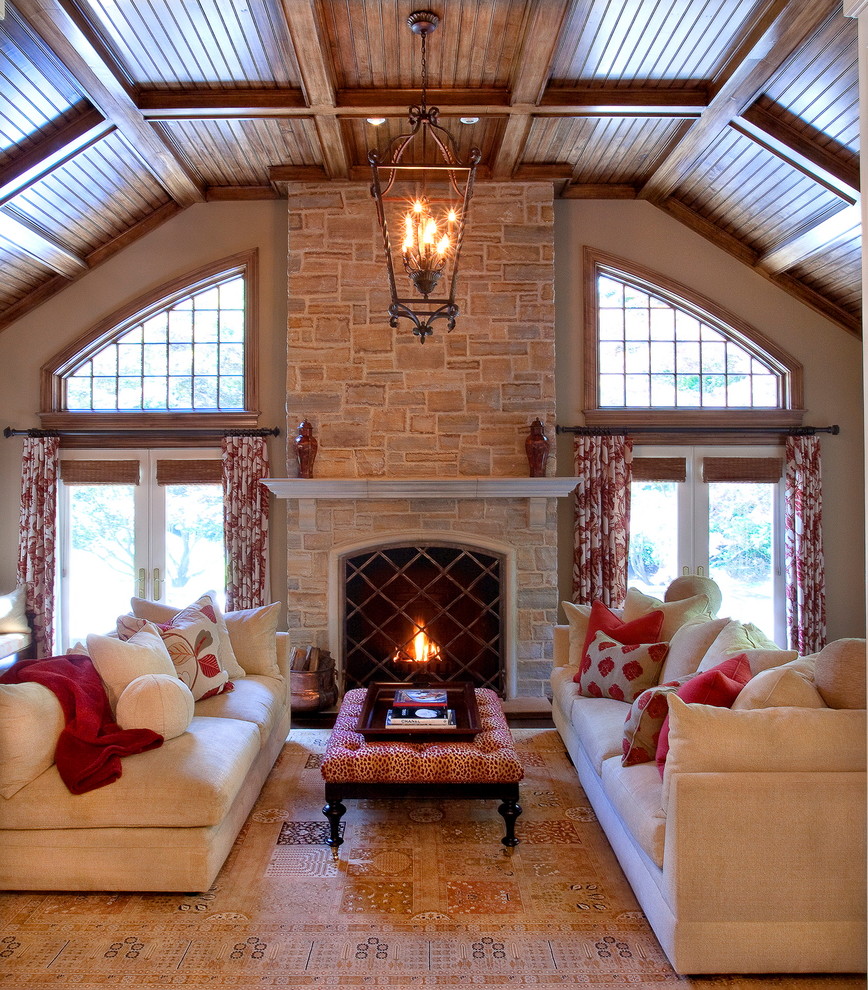 This is an example of a classic games room in New York with a stone fireplace surround.