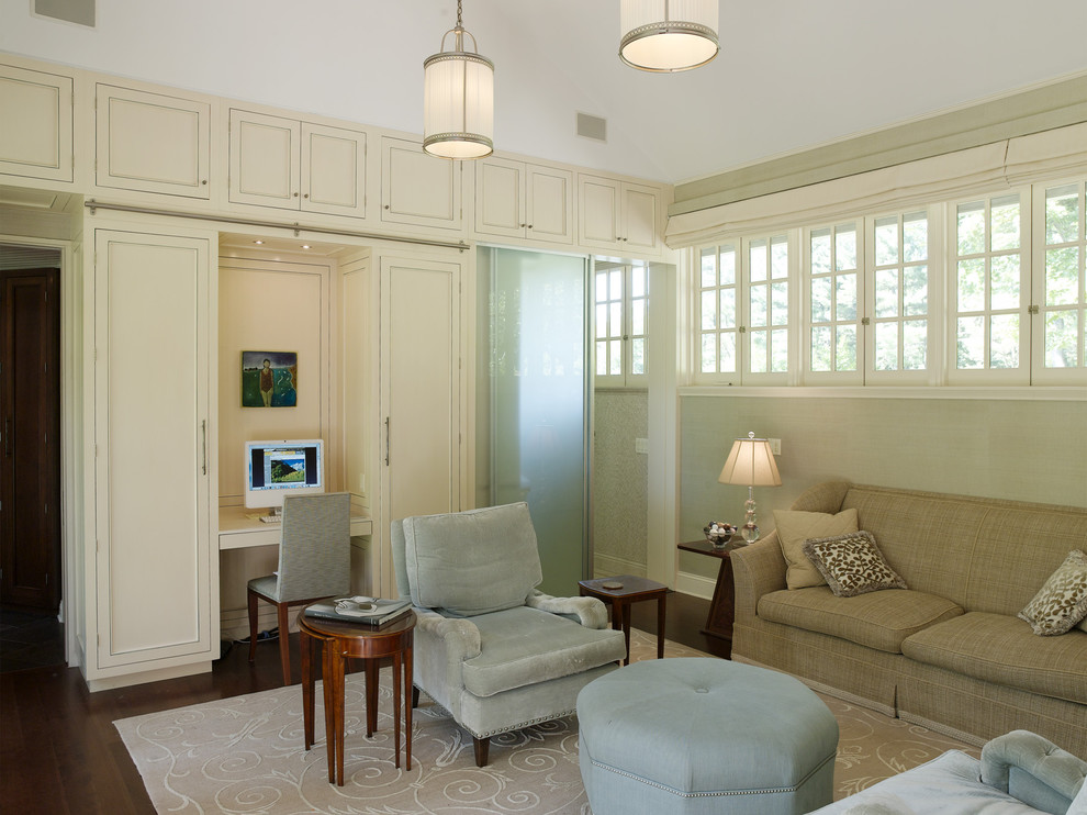 Inspiration for a contemporary enclosed dark wood floor family room remodel in New York with beige walls