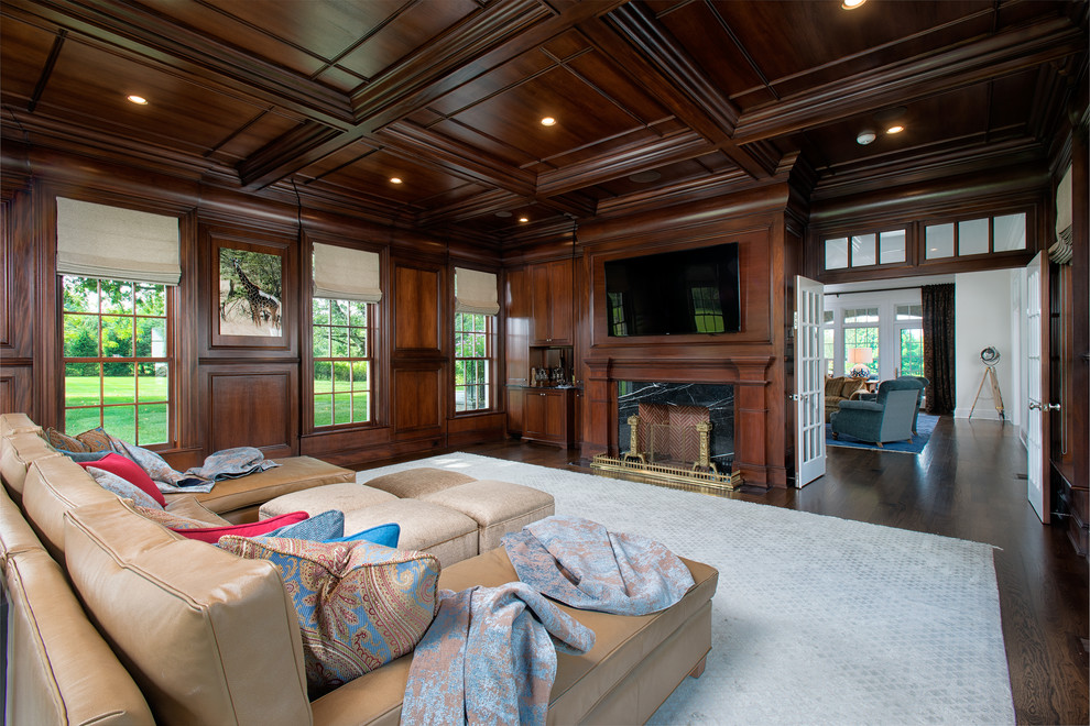 Inspiration for a classic enclosed games room in New York with brown walls, dark hardwood flooring and a wall mounted tv.