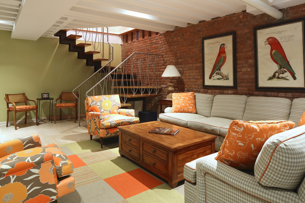 Ispirazione per un grande soggiorno eclettico stile loft con pareti verdi, pavimento in gres porcellanato e TV a parete