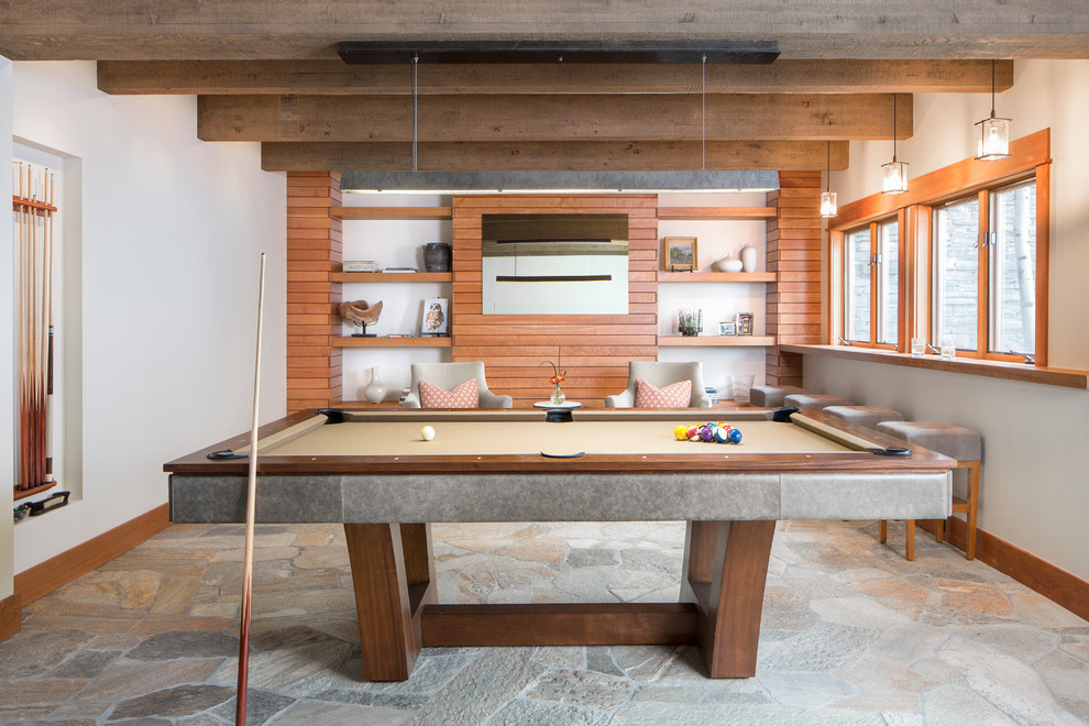 Inspiration for a large contemporary enclosed family room remodel in Other with white walls, a concealed tv and no fireplace
