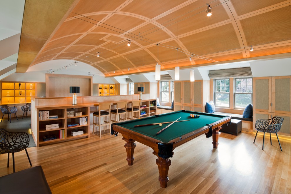Inspiration for an expansive classic open plan games room in Boston with grey walls, light hardwood flooring, no fireplace and brown floors.