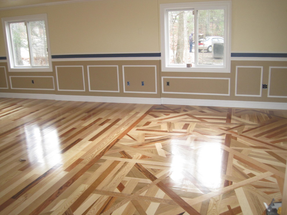 Large arts and crafts enclosed light wood floor family room photo in Boston with beige walls