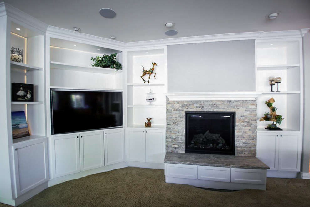 Photo of a medium sized modern open plan games room in Orange County with white walls, carpet, a standard fireplace, a stone fireplace surround, no tv and beige floors.
