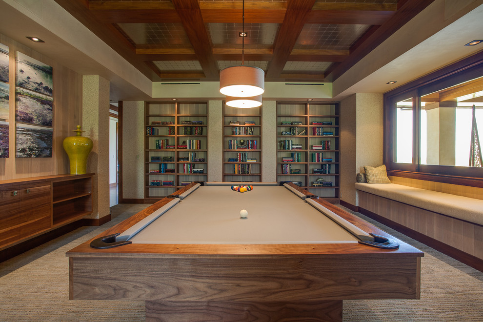 World-inspired enclosed games room in Vancouver with beige walls, carpet and no fireplace.