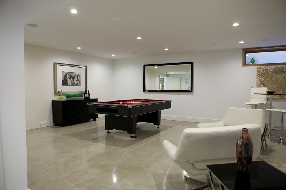 Inspiration for a large coastal open concept concrete floor game room remodel in Los Angeles