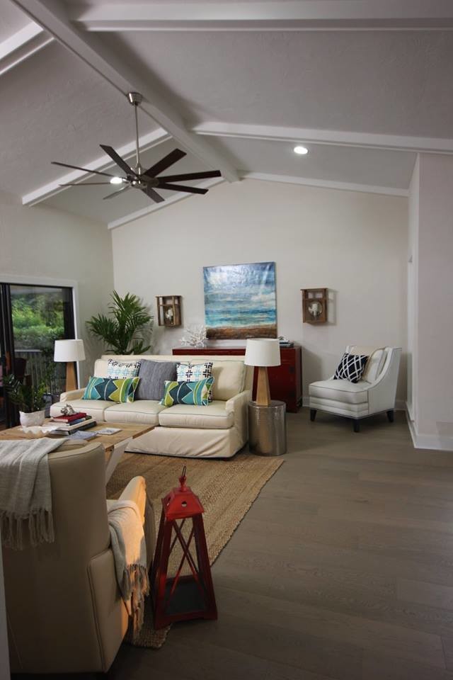 Photo of a coastal open plan games room in Miami with light hardwood flooring.