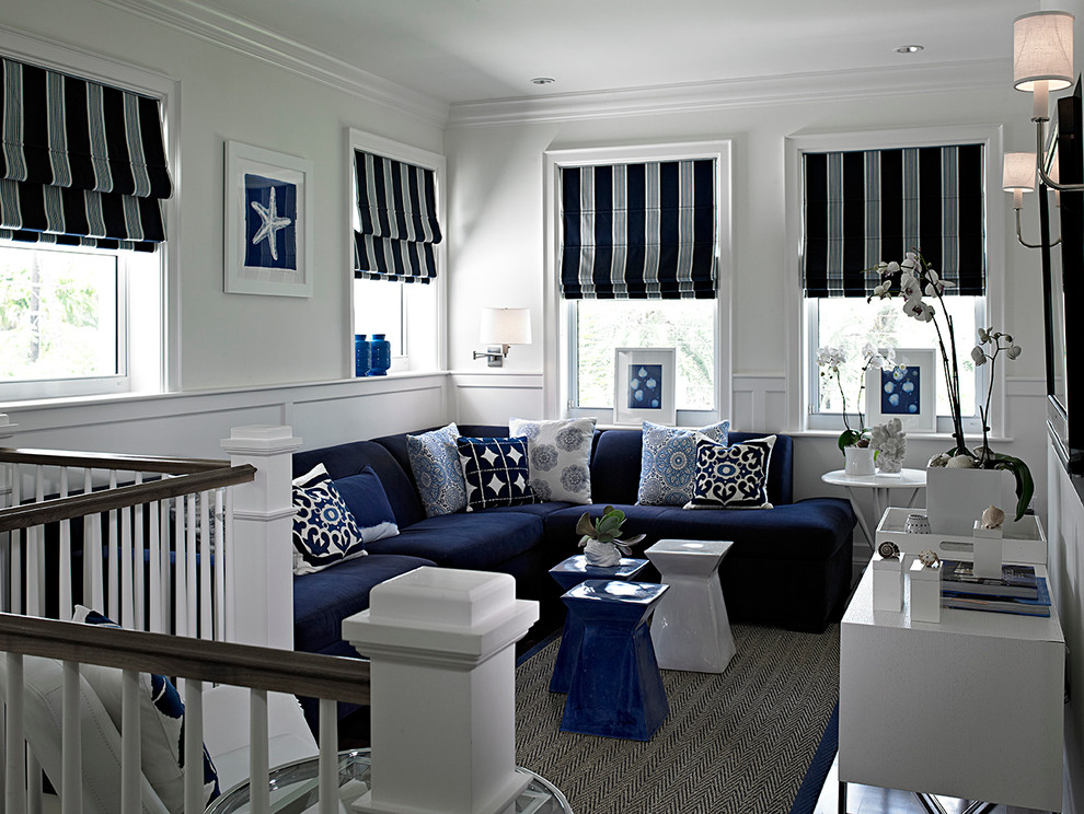 Example of a mid-sized transitional loft-style dark wood floor and gray floor family room design in Miami with white walls, no fireplace and a wall-mounted tv