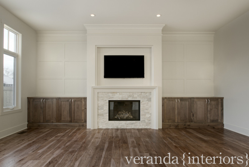 Example of a transitional family room design in Calgary