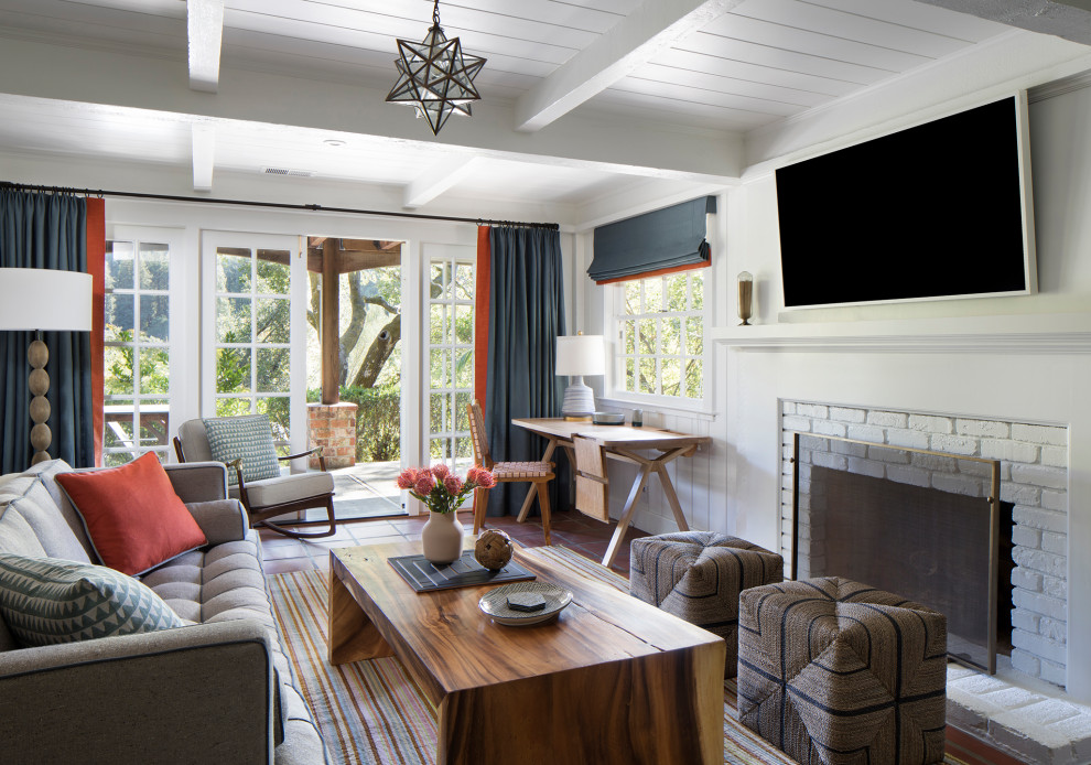 Inspiration for a large timeless enclosed light wood floor, beige floor, coffered ceiling and wood wall family room remodel in San Francisco with white walls, a standard fireplace, a brick fireplace and a wall-mounted tv