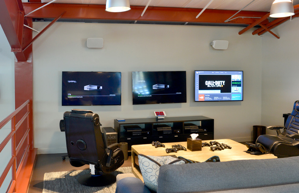 Photo of a medium sized farmhouse mezzanine games room in Atlanta with beige walls, no fireplace, a wall mounted tv, lino flooring and a stone fireplace surround.