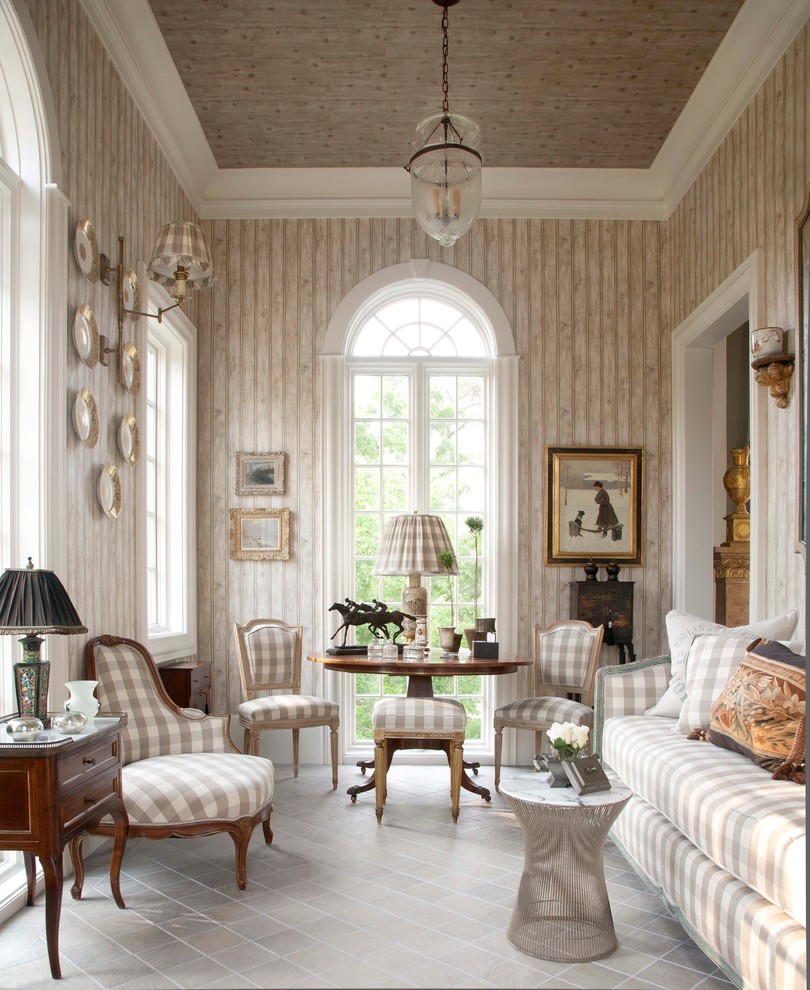 Family room - traditional enclosed family room idea in Houston with beige walls