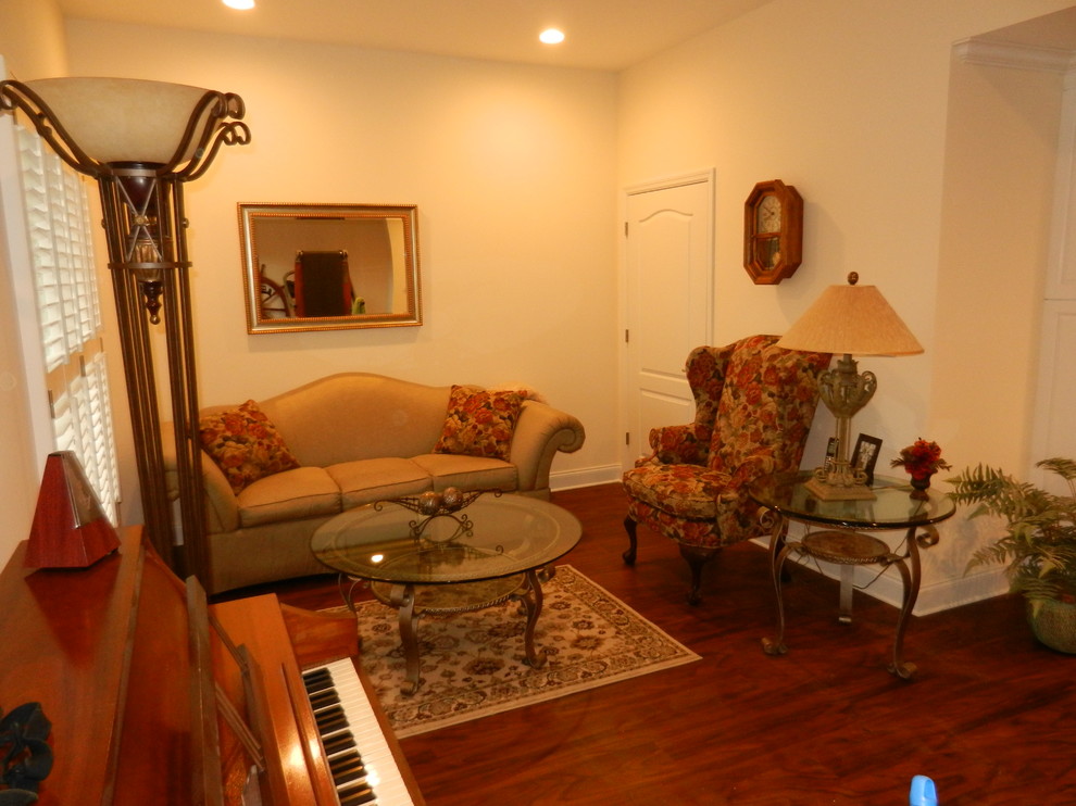 Photo of a classic enclosed games room in Charleston with medium hardwood flooring.
