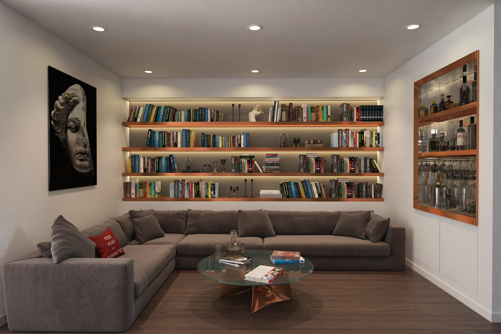 Idées déco pour une salle de séjour contemporaine avec une bibliothèque ou un coin lecture, un mur blanc, parquet foncé et un sol marron.