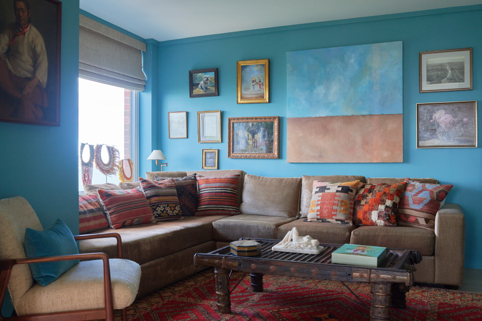 Immagine di un soggiorno contemporaneo con pareti blu